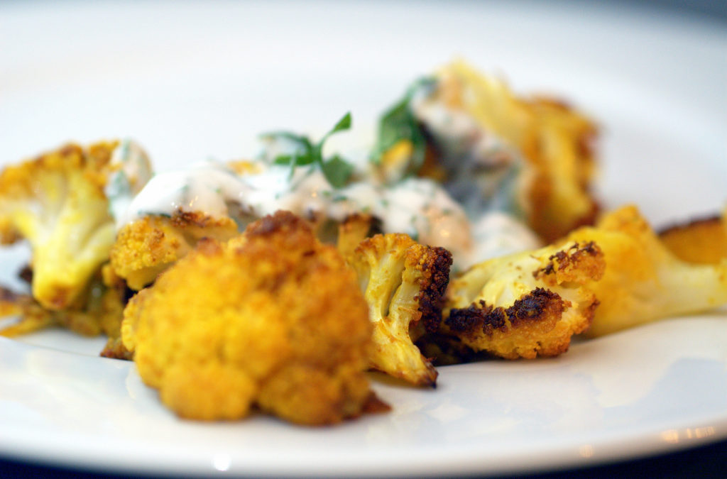 ROASTED CAULIFLOWER WITH INDIAN SPICES AND YOGURT DRESSING
